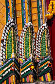 Bangkok Wat Pho, decoration detail of the entrance of the court of the mandop. 